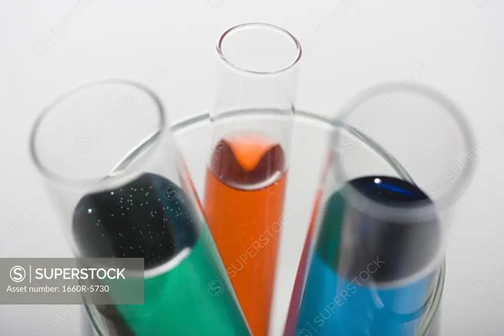High angle view of liquid inside three test tubes