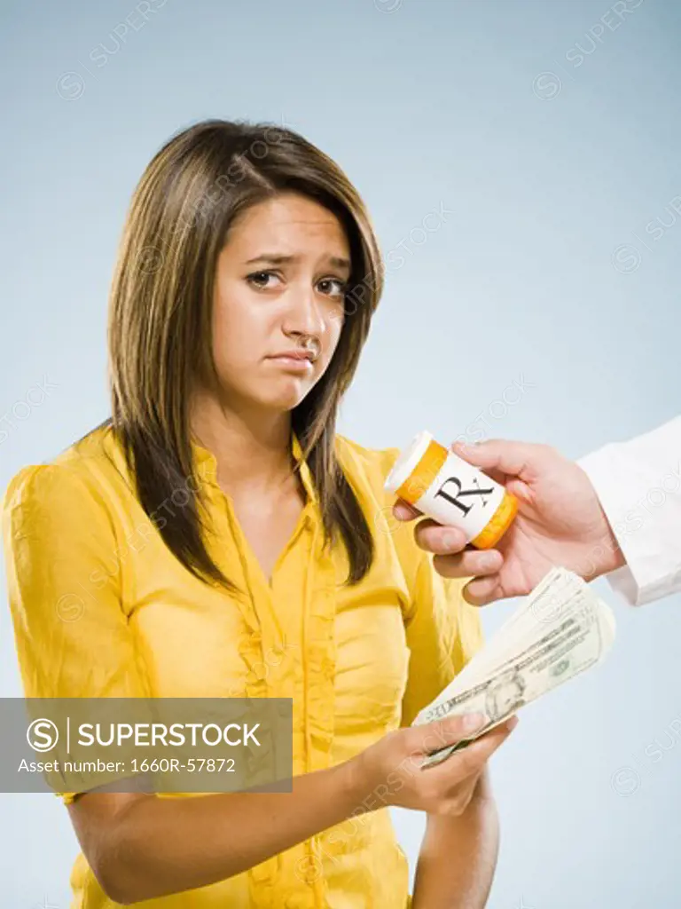 Woman paying for prescription