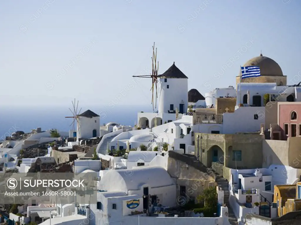 Aerial view of Greek village with wavy flag