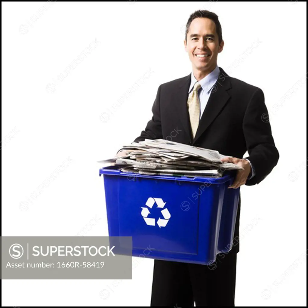 businessperson holding a recycling bin