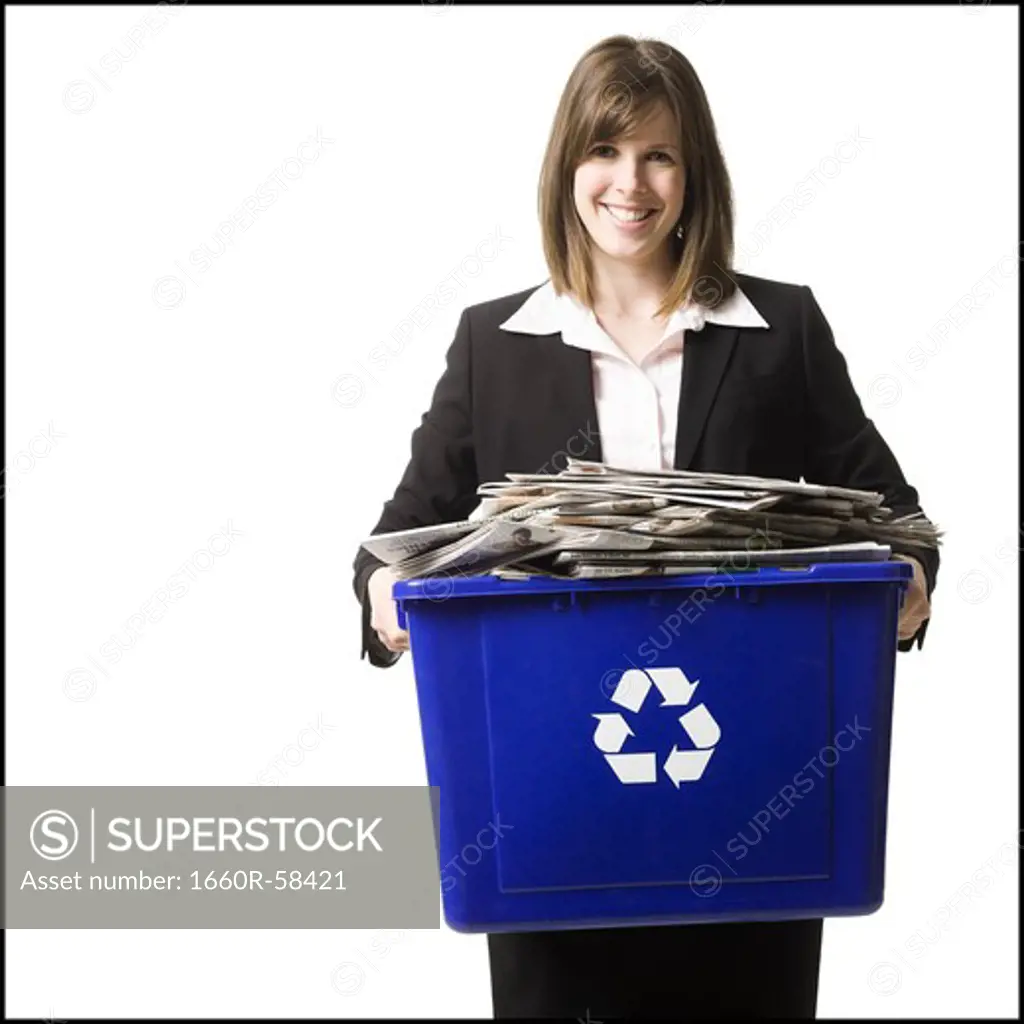 businessperson holding a recycling bin