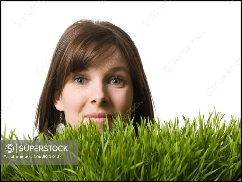 woman's head in the grass