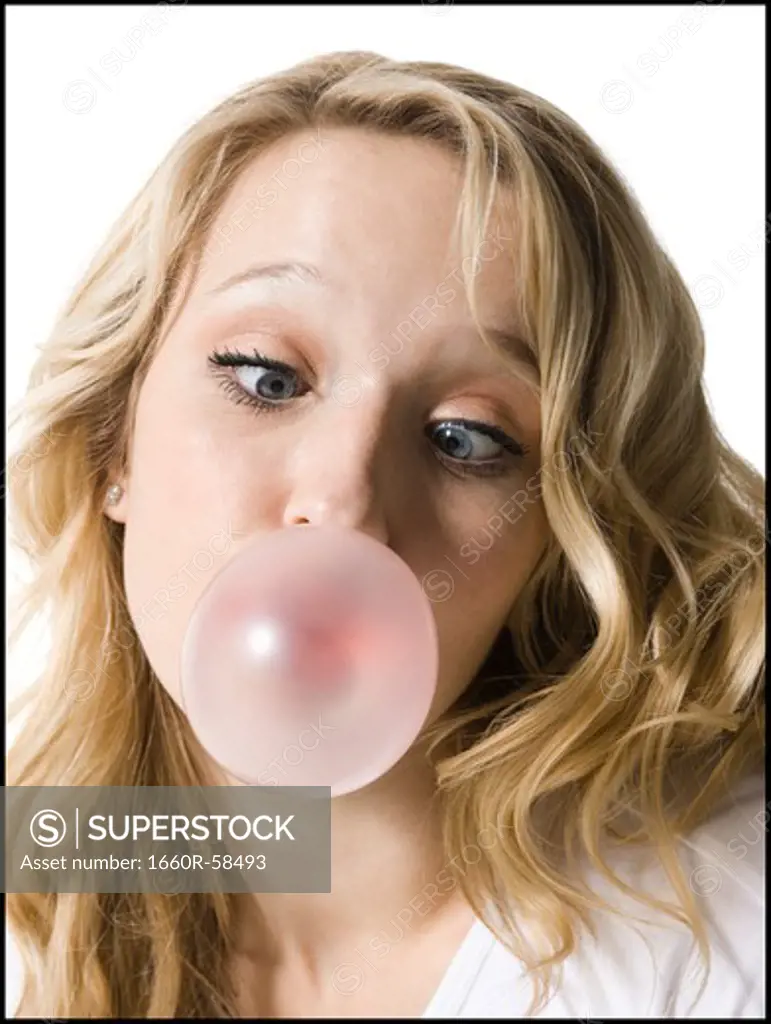 young woman chewing bubble gum