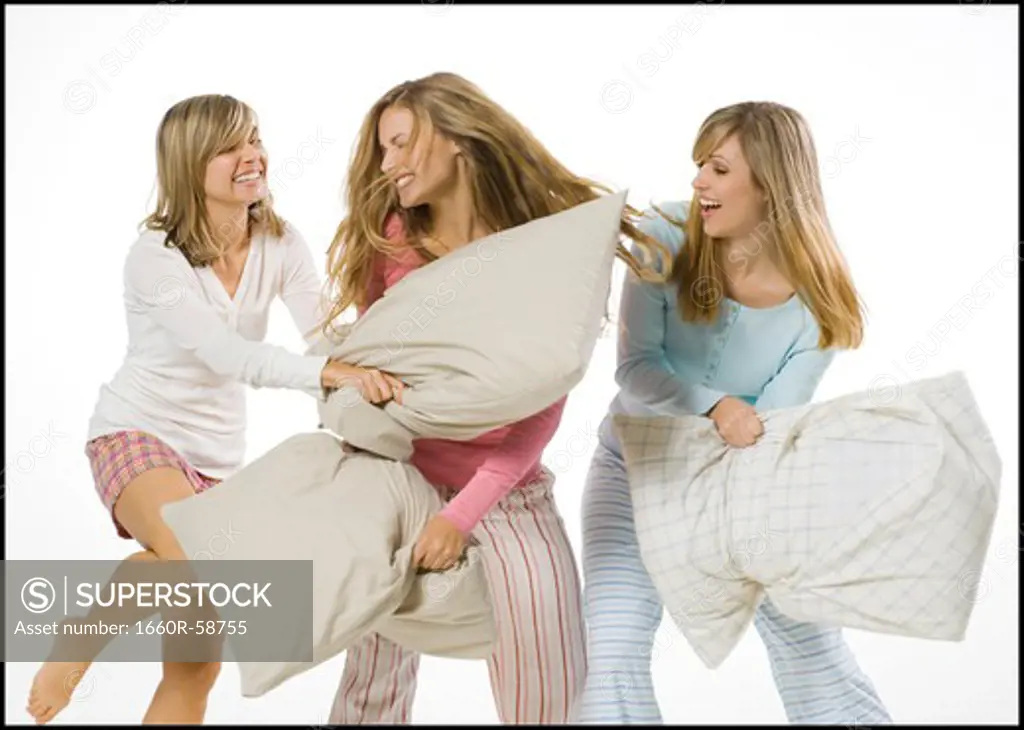 girls having a pillow fight