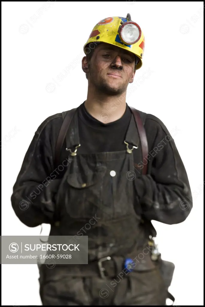Mine worker with flashlight helmet