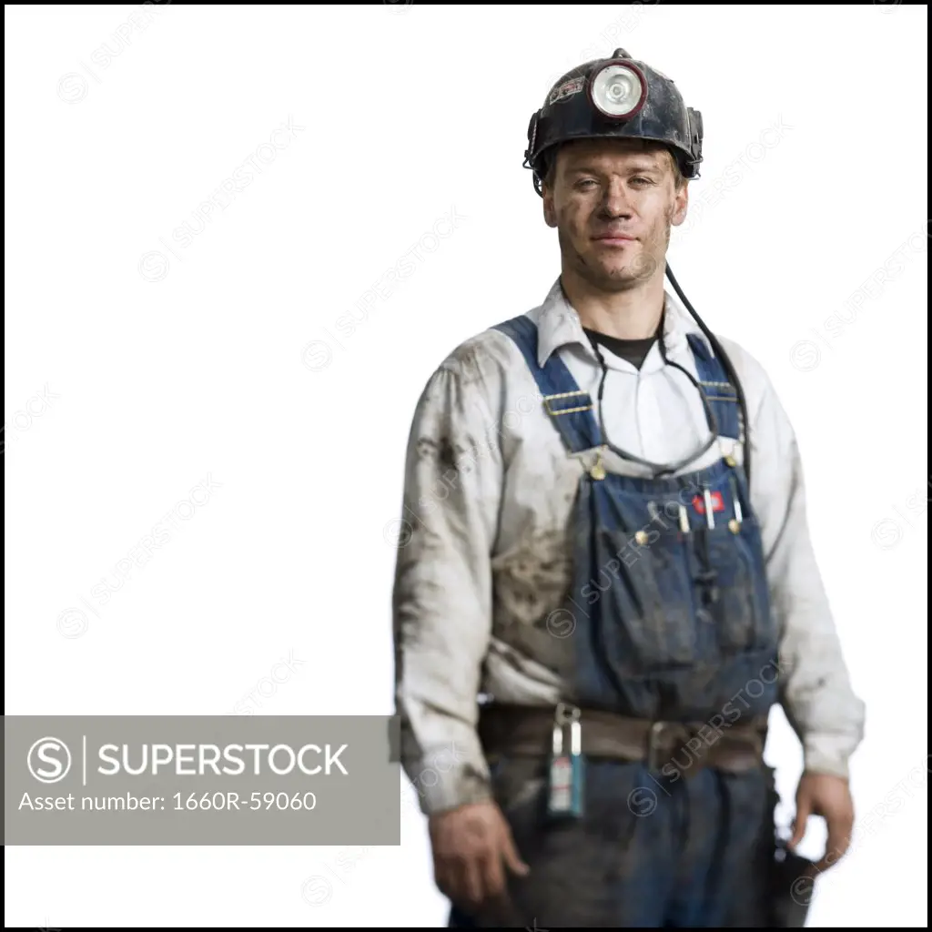 Mine worker with flashlight helmet