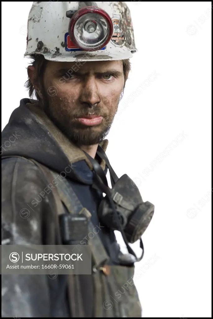 Mine worker with flashlight helmet