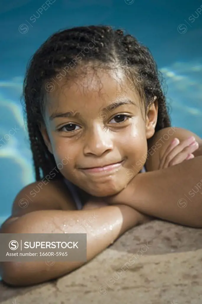 Portrait of a girl in a swimming pool