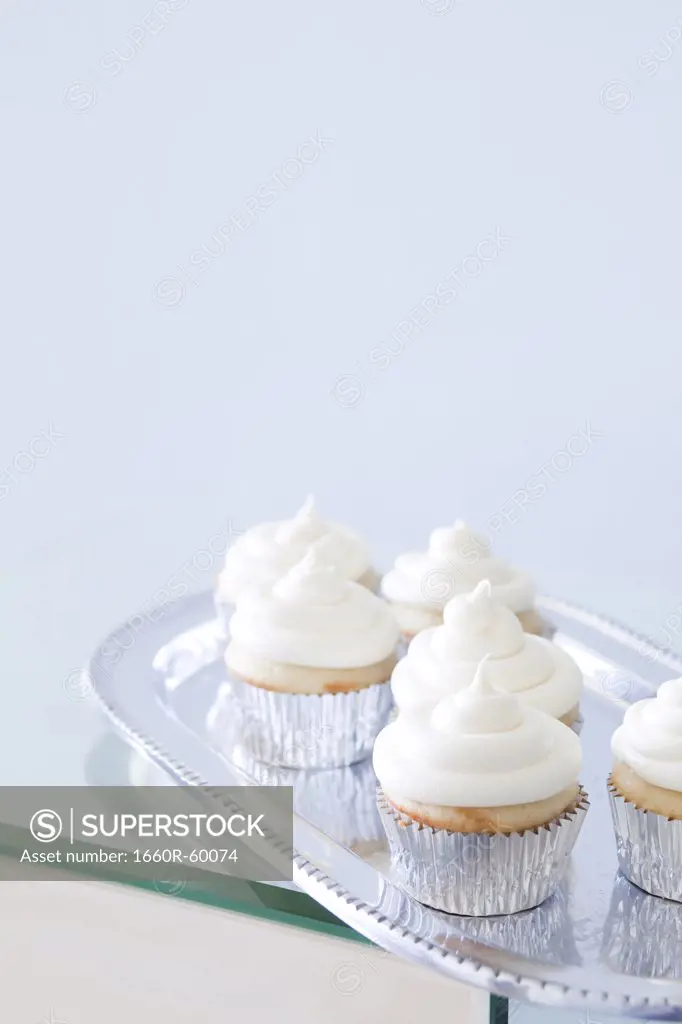 USA, California, San Francisco, cupcakes with frosting on silver plate