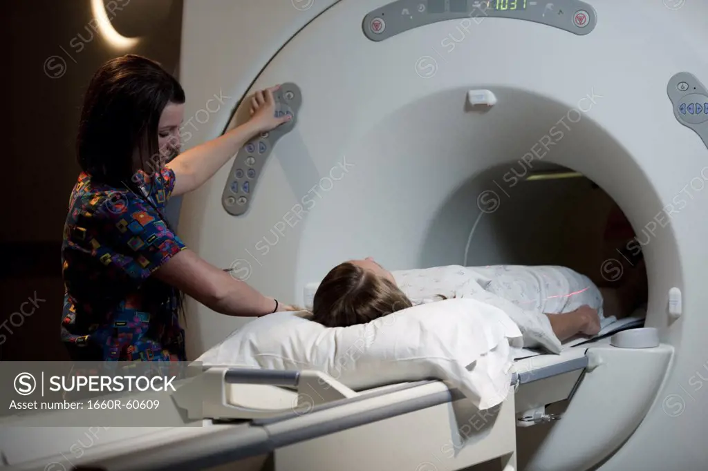 USA, Utah, Payson, Young woman during Magnetic Resonance Imaging
