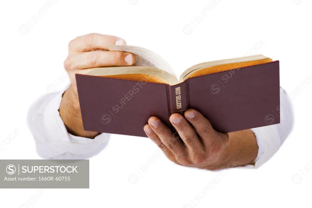 Hands holding bible