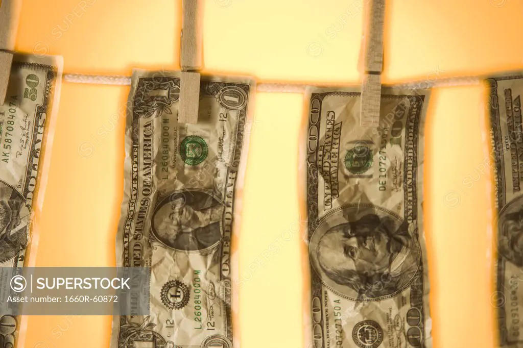 Banknotes on clothesline