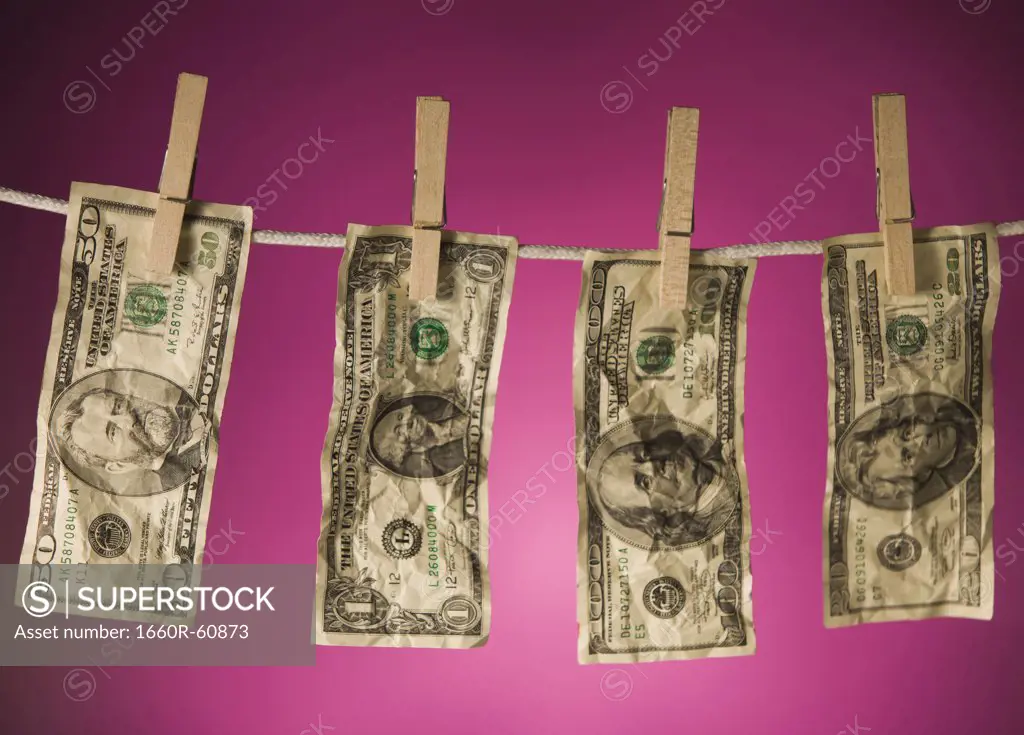 Banknotes on clothesline