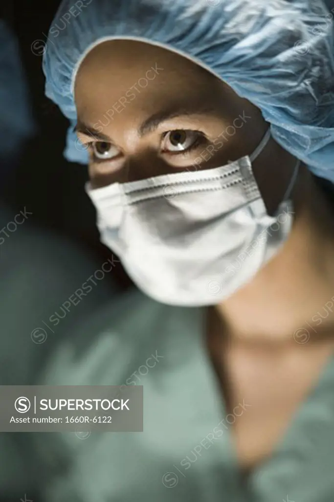 Close-up of a female surgeon in an operating room
