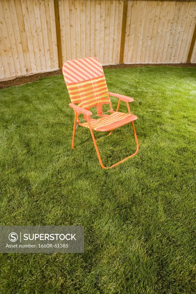 Orange lawn chair outside