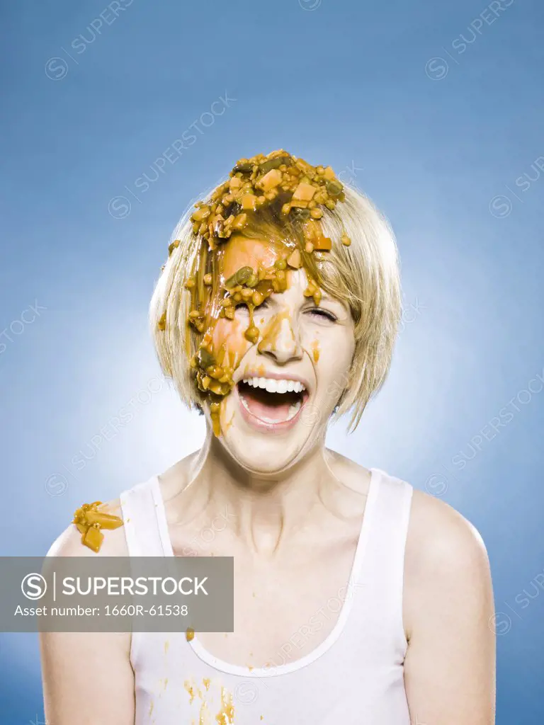 woman getting food dumped on her head