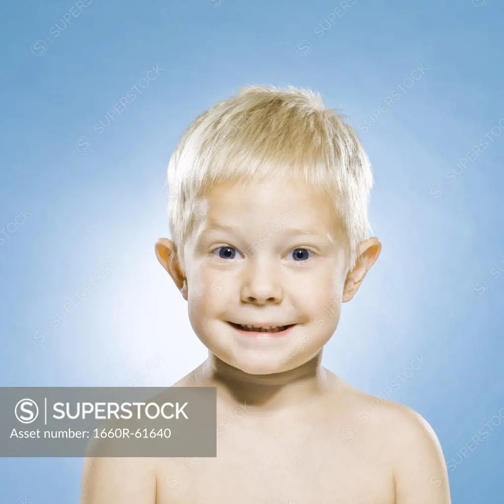 boy against a blue background