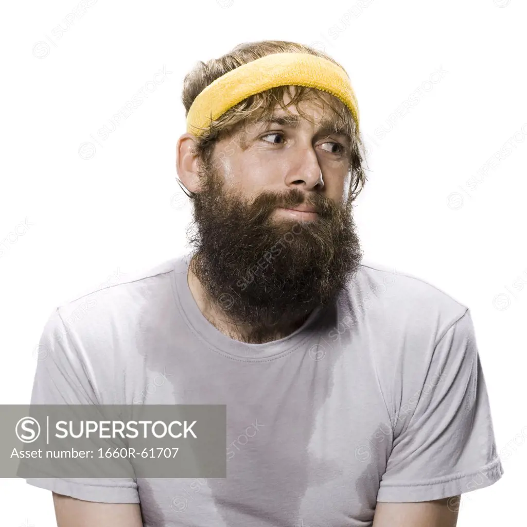 bearded man wearing a headband