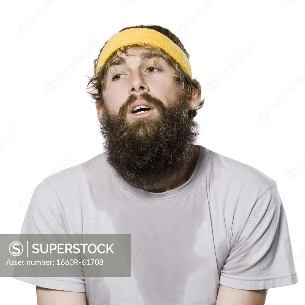 bearded man wearing a headband