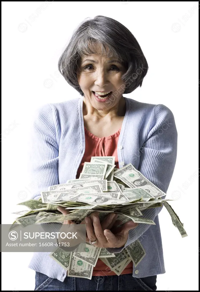 woman with an armfull of money