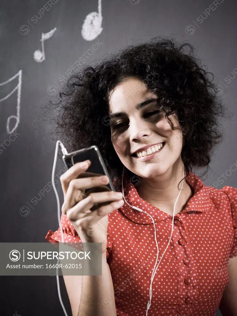 woman listening to mp3 player
