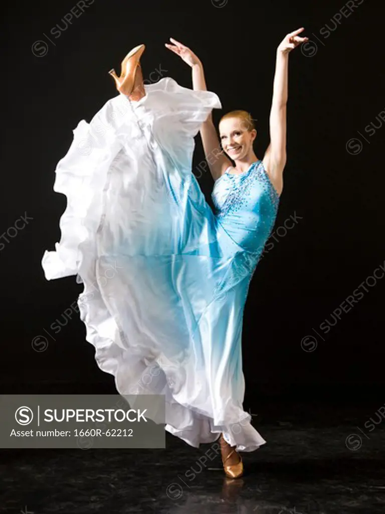 Young woman ballroom dancing