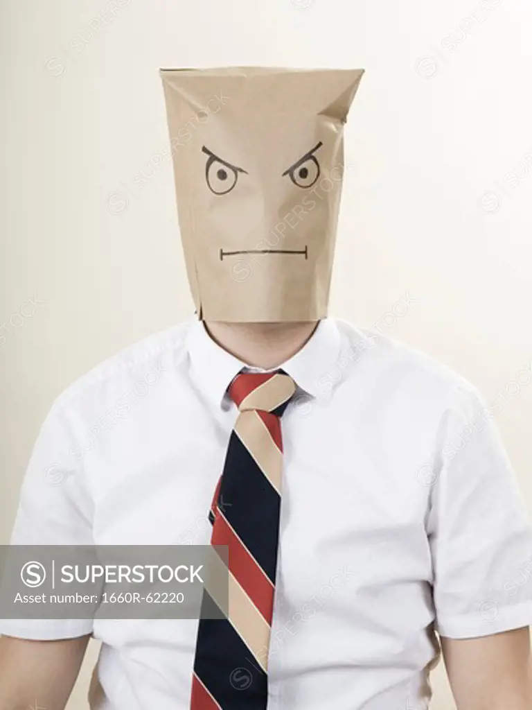 businessman with a brown paper bag over his head