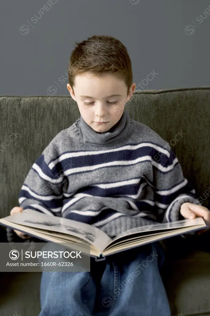 Boy reading book