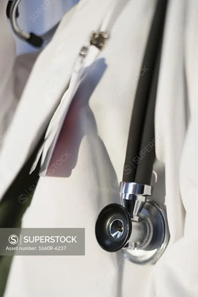 Mid section view of a doctor with a stethoscope