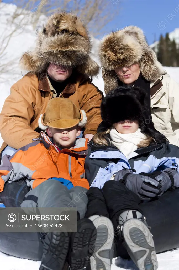 Family portrait with fur hats