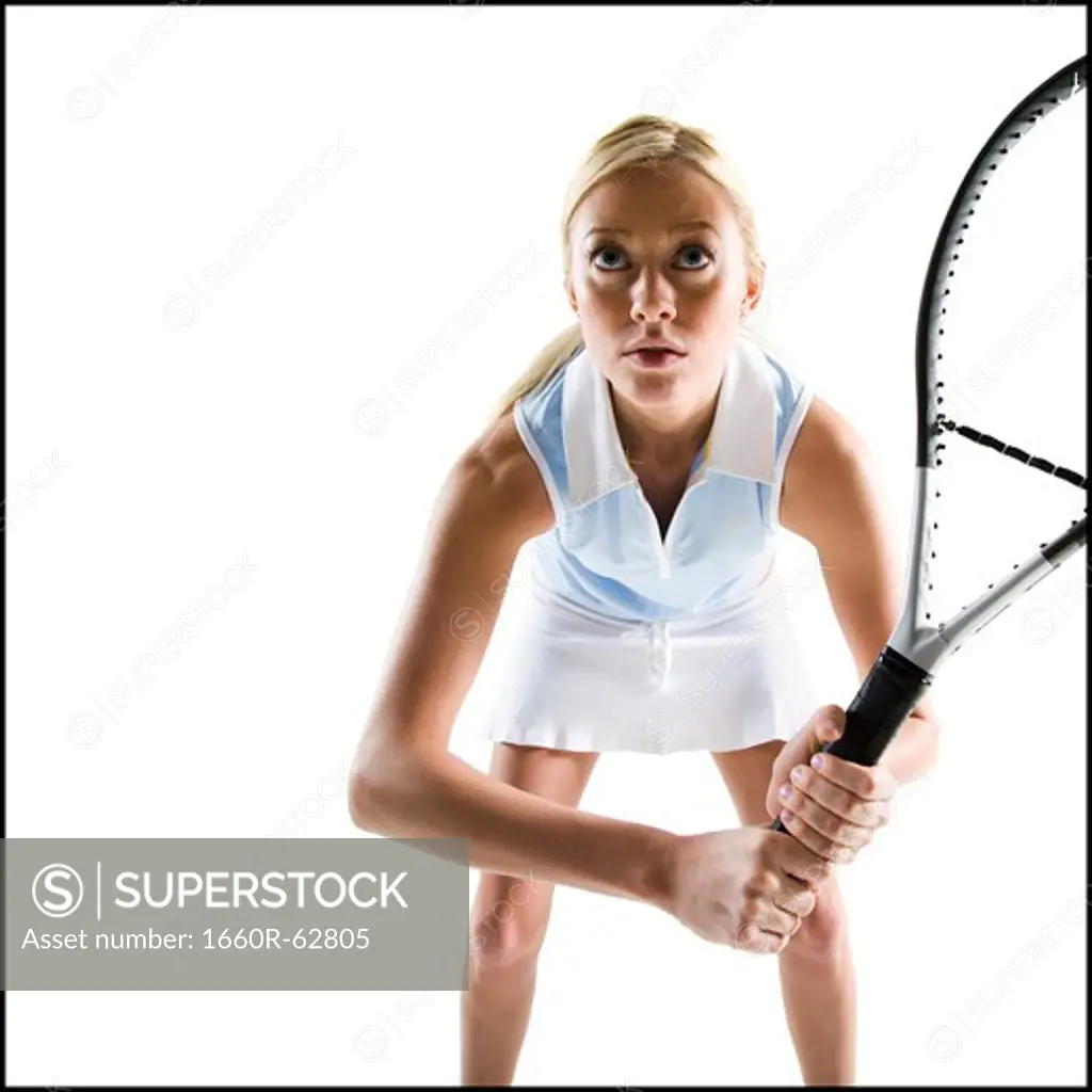 Close-up of tennis player with racket