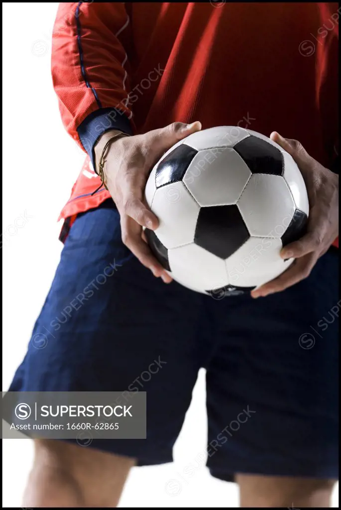 Soccer player holding groin
