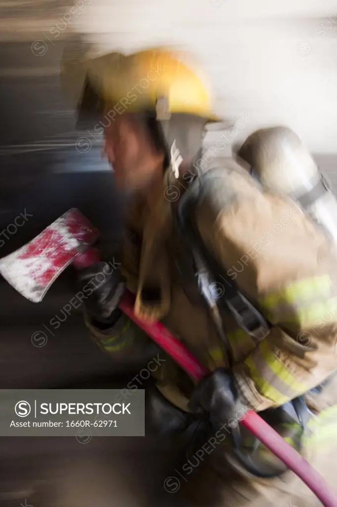 Male firefighter in action