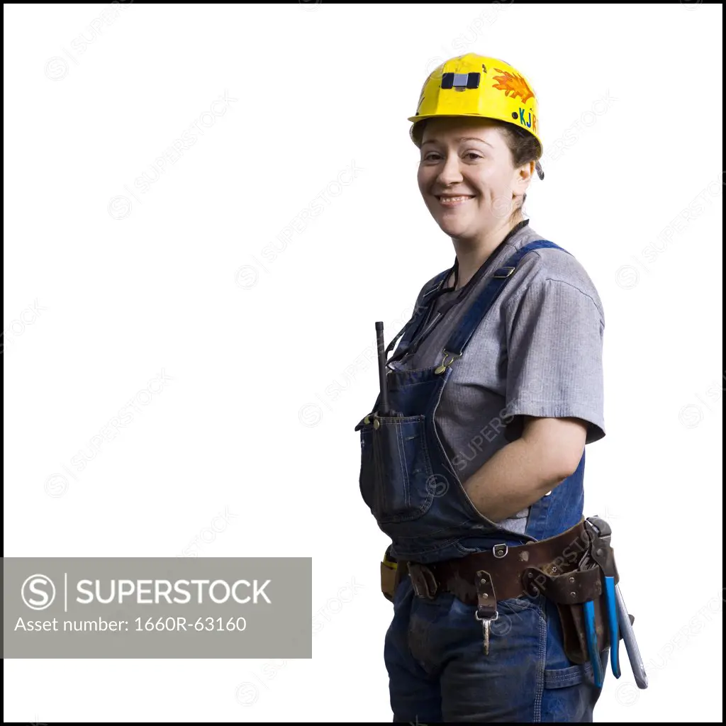 Female construction worker with hardhat