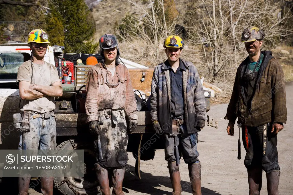 Group of four miners