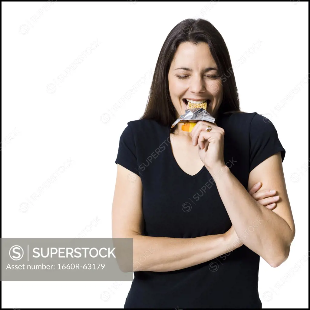 Woman eating a snack bar