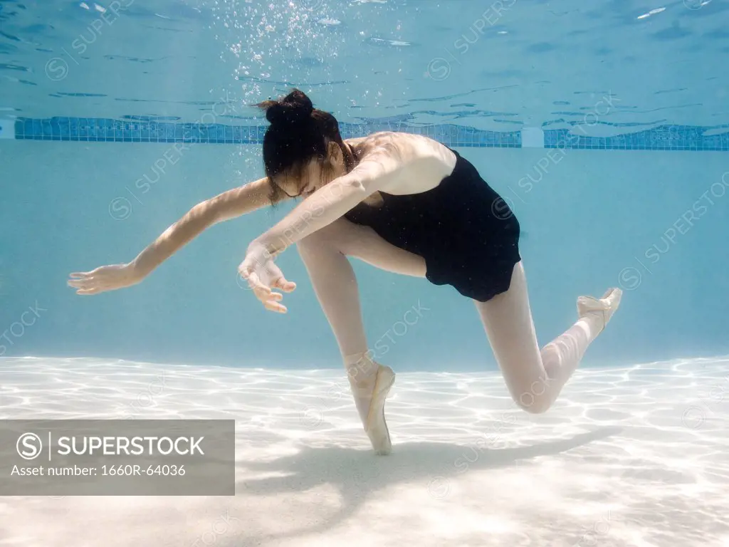USA, Utah, Orem, Female ballet dancer under water