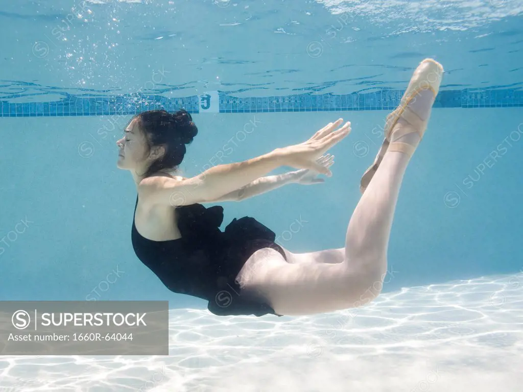 USA, Utah, Orem, Female ballet dancer under water
