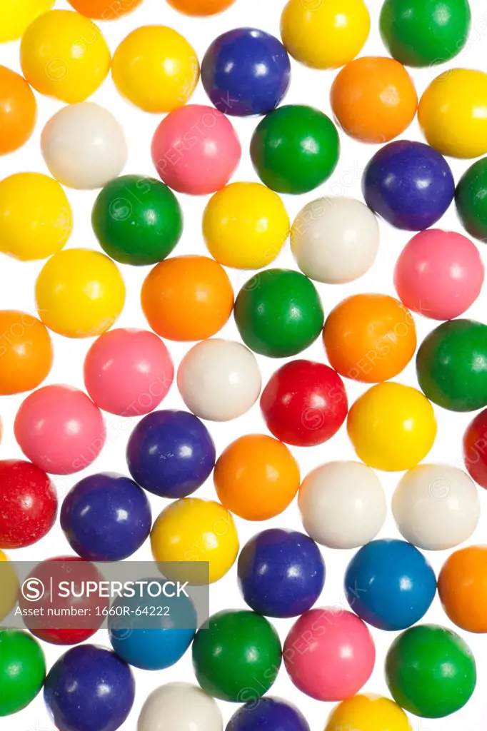 Colorful balls on white background forming abstract pattern