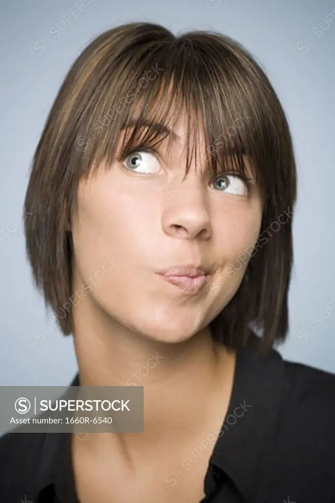 Close-up of a teenage girl making a face