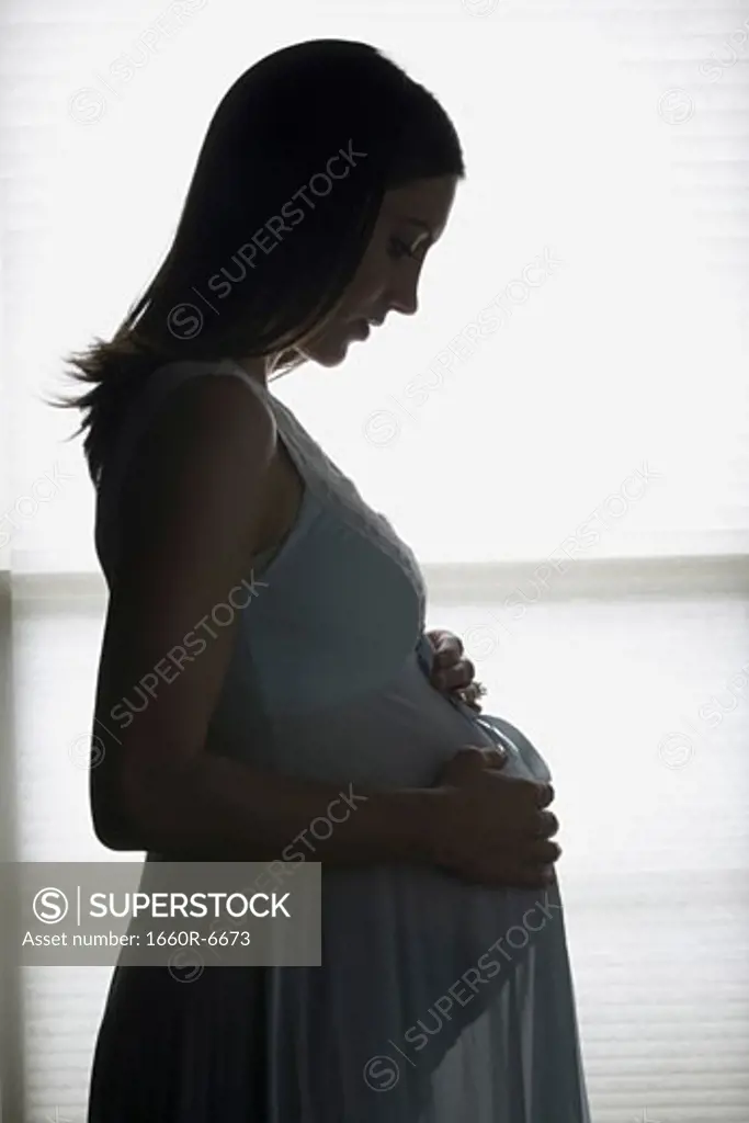 Profile of a pregnant woman