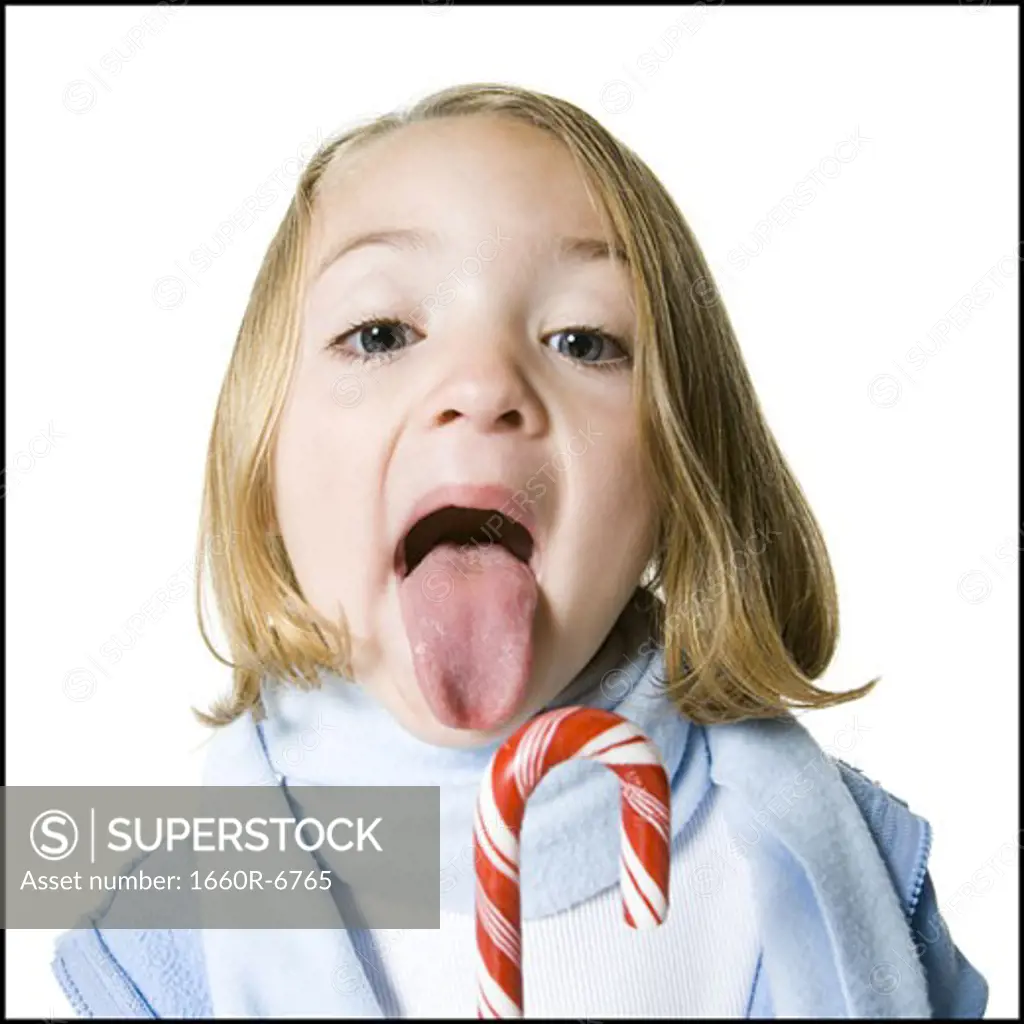 Portrait of a girl sticking her tongue out