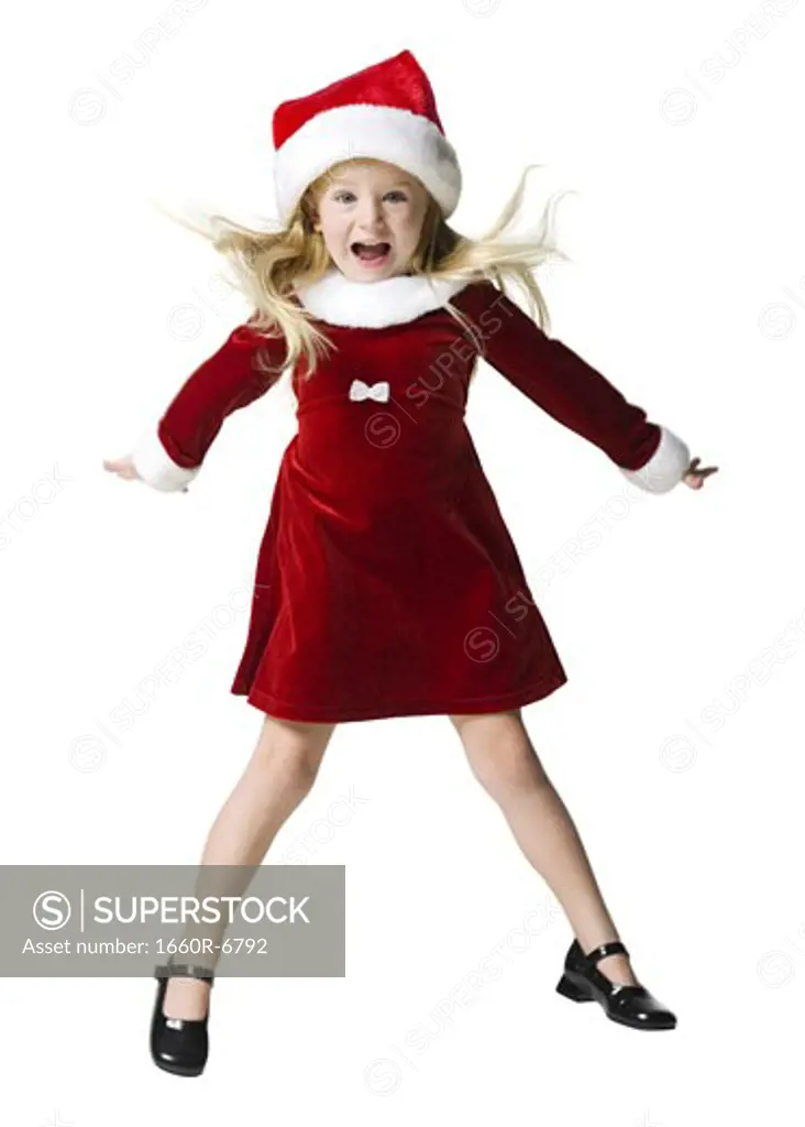 Portrait of a girl jumping with her arms outstretched