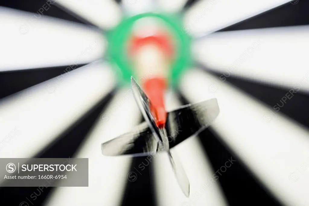 Close-up of a dart on a dartboard