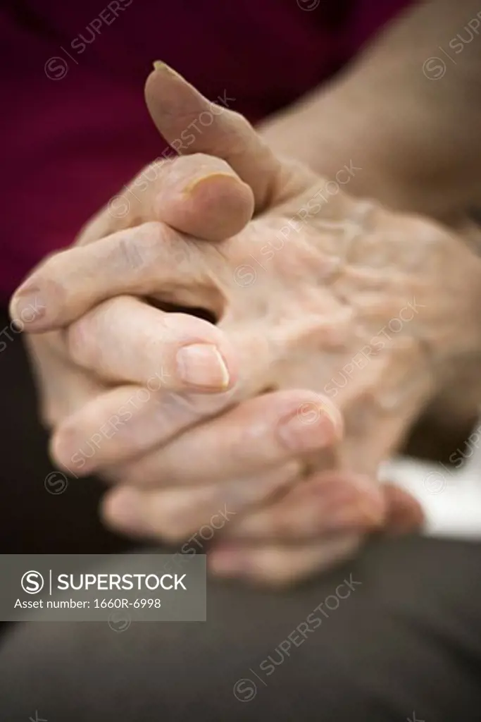 Close-up of a senior couple's hands