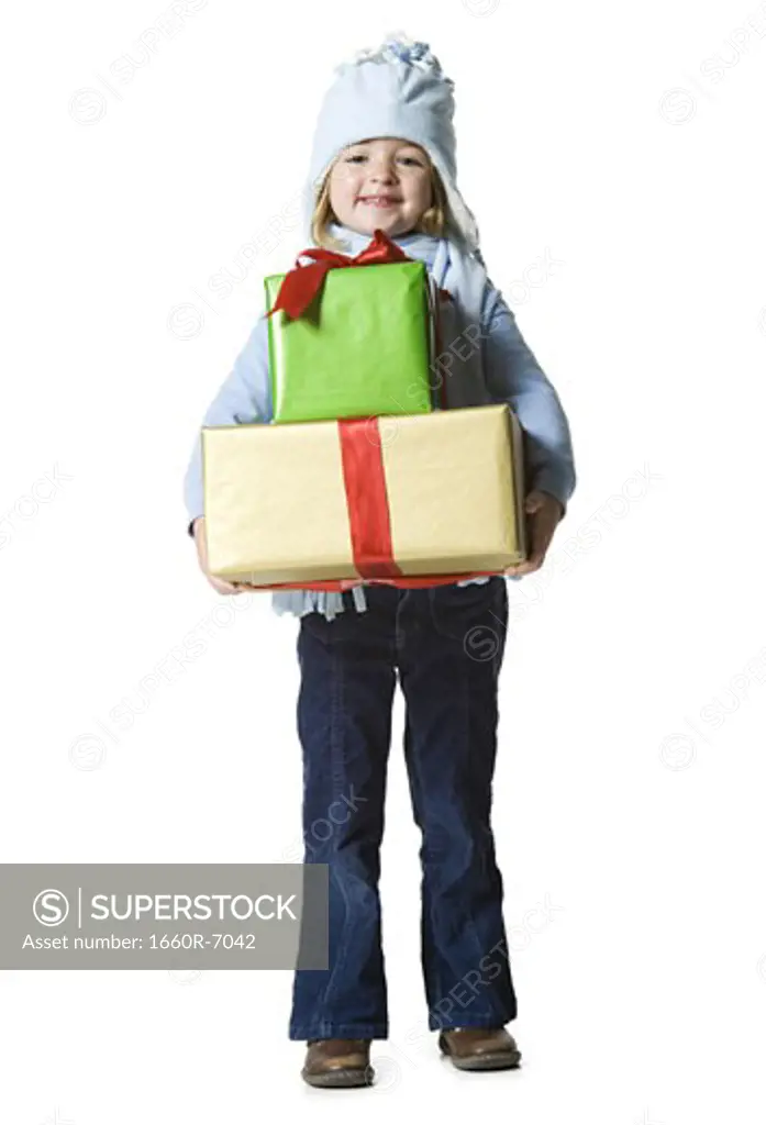 Portrait of a girl holding gifts