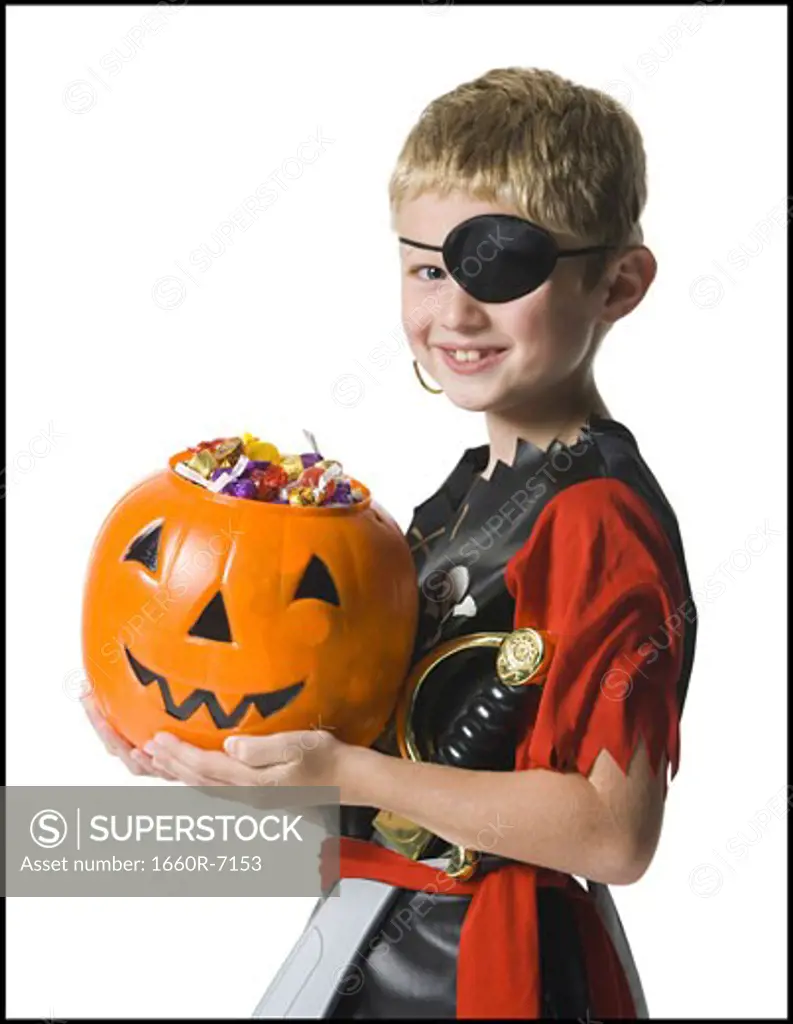 Portrait of a boy dressed as a pirate and trick or treating