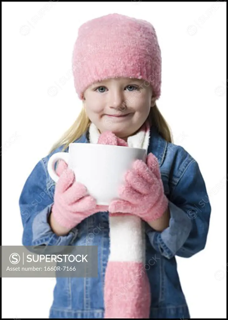 Portrait of a girl holding a cup