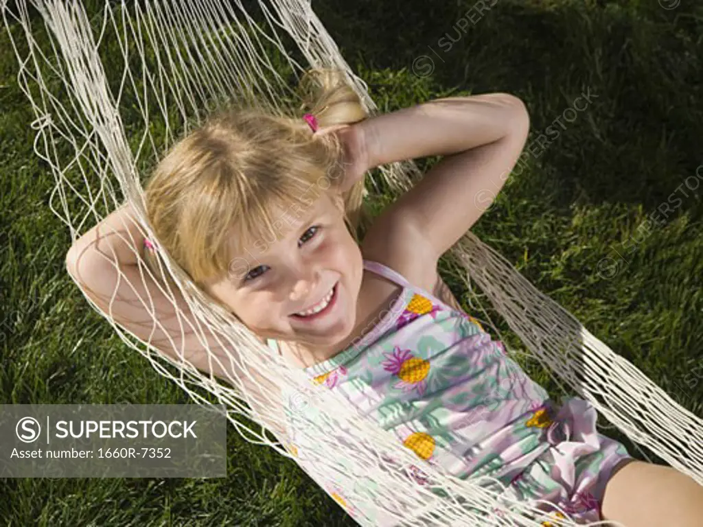 High angle view of a girl relaxing in a hammock