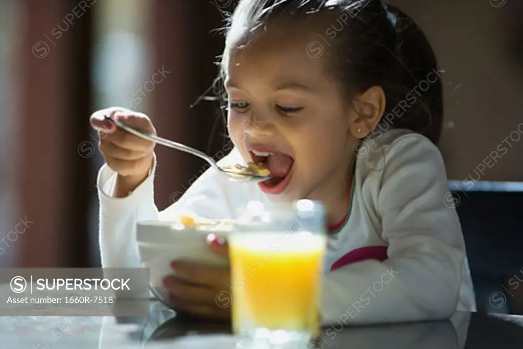 Close-up of a girl eating cereal